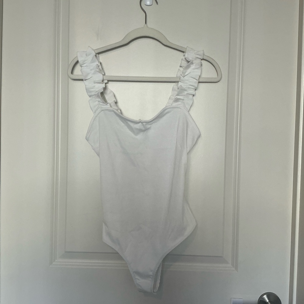 Francesca’s White Ruffle Bodysuit